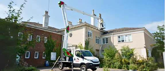 using our cherry picker on a commercial gutter cleaning job in Warwickshire